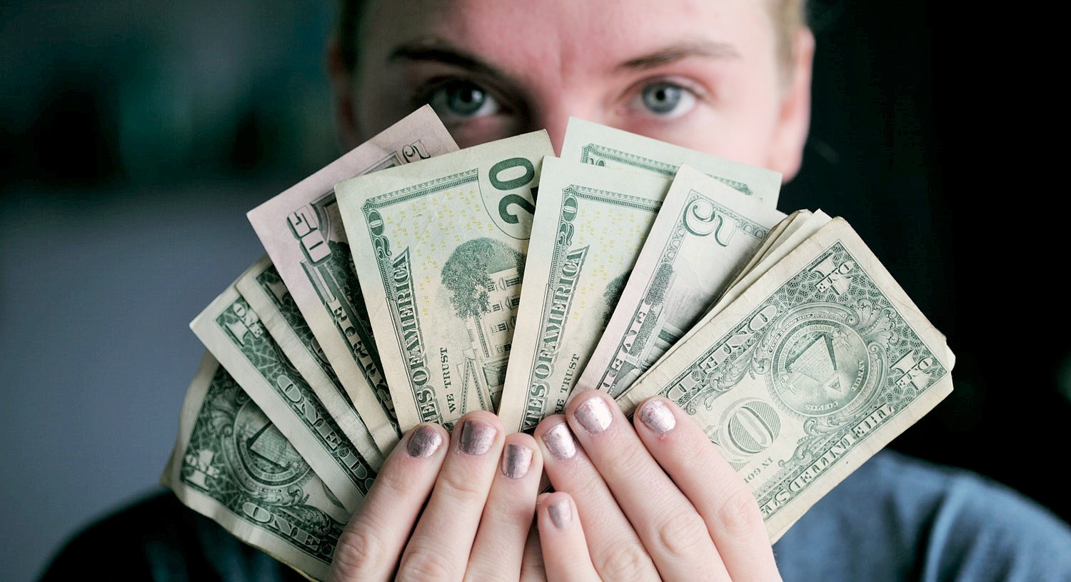 woman holding money