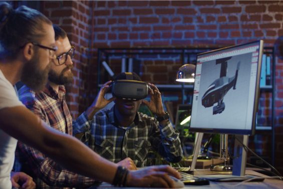 Software developers and designers creating VR prototype